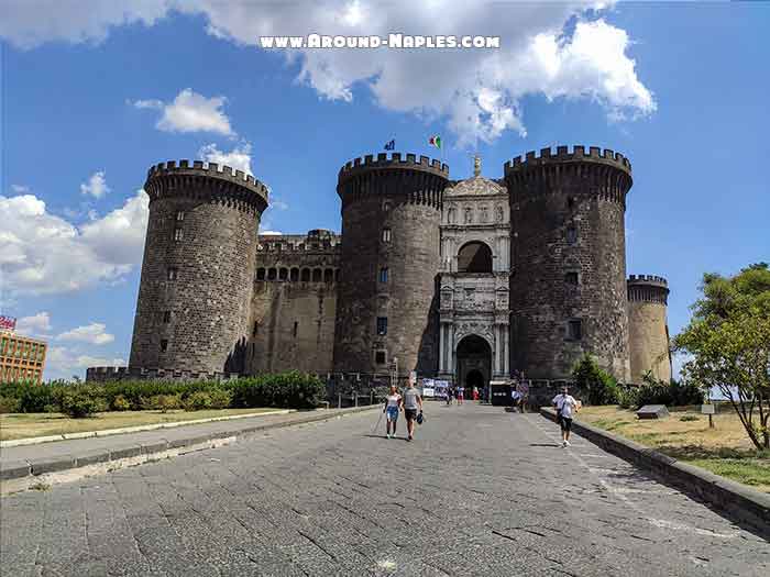 Front view of New Castle (Castel Nuovo - Maschio Angioino) in Naples with its towers and Renaissance triumphal arch